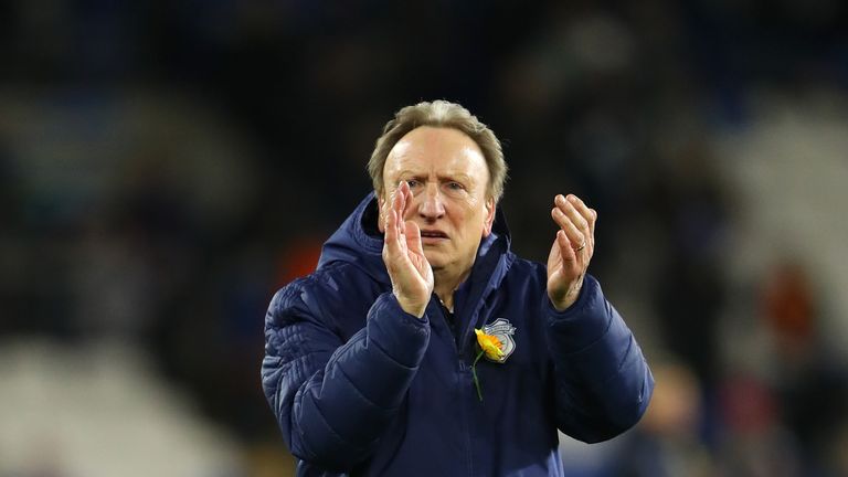 Neil Warnock admitted he was close to tears as he applauded the Cardiff supporters.