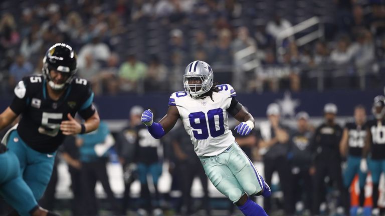 Dallas Cowboys defensive end DeMarcus Lawrence heads towards the backfield