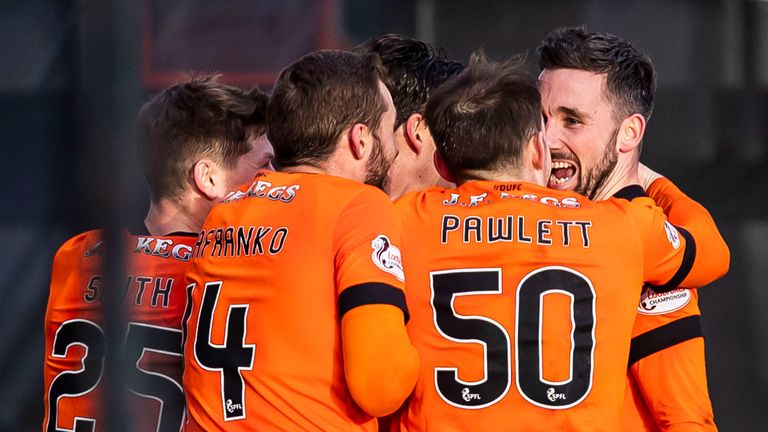 Dundee United's Nicky Clark (R) celebrates doubling his side's lead