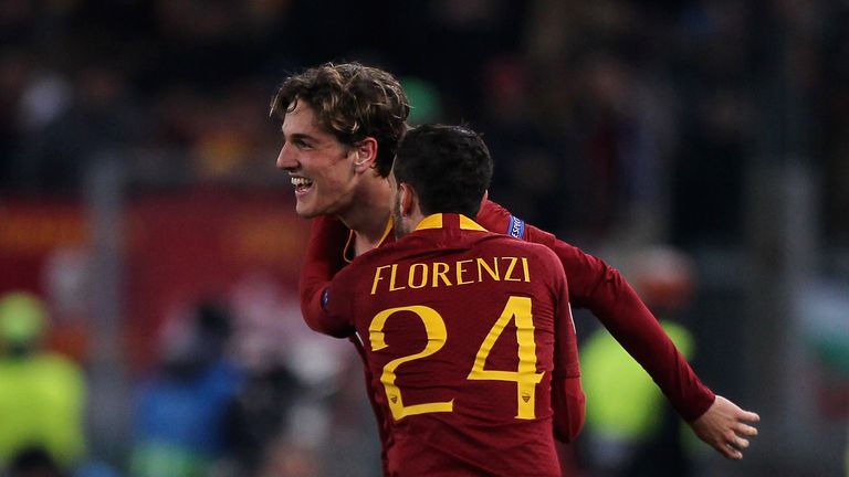 Nicolo' Zaniolo #22 with his teammate Alessandro Florenzi of AS Roma celebrates after scoring the team's first goal during the UEFA Champions League Round of 16 First Leg match between AS Roma and FC Porto at Stadio Olimpico on February 12, 2019 in Rome.  (Photo by Paolo Bruno/Getty Images)