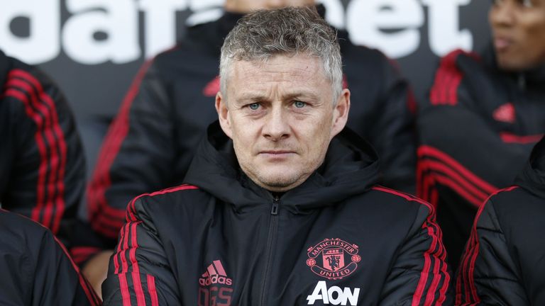 Ole Gunnar Solskjaer awaits kick-off at Craven Cottage