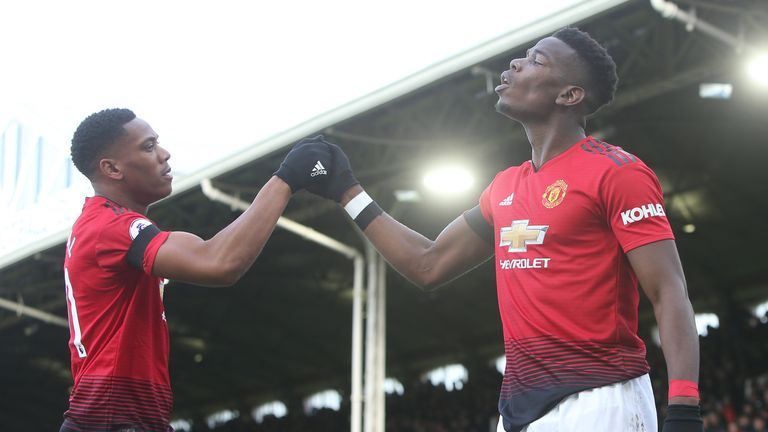 Paul Pogba celebrates scoring Manchester United's first goal with team-mate Anthony Martial