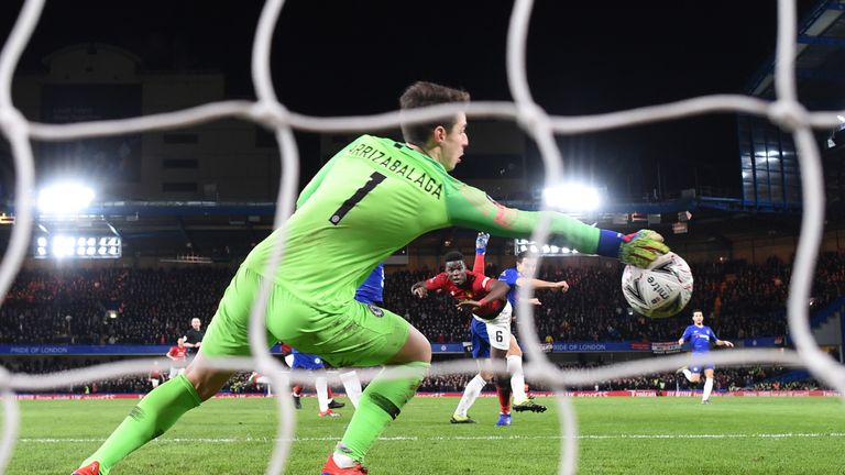 Manchester United's Paul Pogba heads beyond Chelsea's Kepa Arrizabalaga in the FA Cup at Stamford Bridge, February 2019