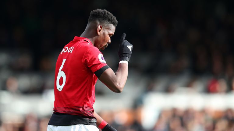 Paul Pogba celebrates his second and Manchester United's third goal