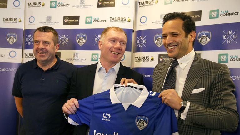 Paul Scholes is unveiled as the new Oldham Athletic manager alongside owner Abdallah Lemsagam (right) and assistant Mick Priest during a press conference at Boundary Park