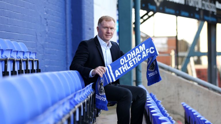New Oldham Athletic manager Paul Scholes poses for photos after his press conference at Boundary Park