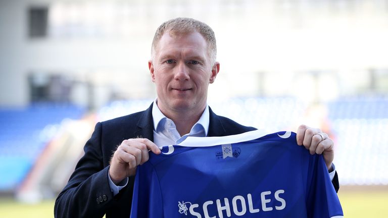 New Oldham Athletic manager Paul Scholes poses for photos after his press conference at Boundary Park