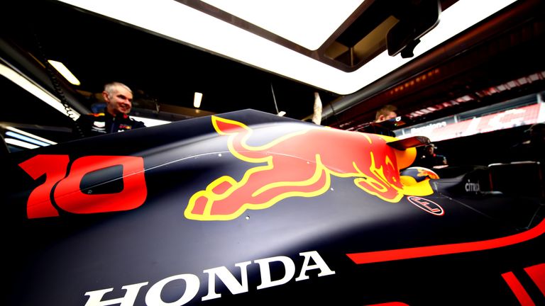 Pierre Gasly in the Red Bull garage preparing to drive on day two of F1 winter testing at Circuit de Catalunya on February 19, 2019