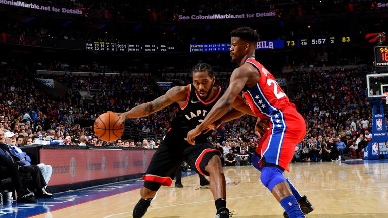 PHILADELPHIA, PA - FEBRUARY 5:  Kawhi Leonard #2 of the Toronto Raptors handles the ball against Jimmy Butler #23 of the Philadelphia 76ers on February 5, 2019 at the Wells Fargo Center in Philadelphia, Pennsylvania NOTE TO USER: User expressly acknowledges and agrees that, by downloading and/or using this Photograph, user is consenting to the terms and conditions of the Getty Images License Agreement. Mandatory Copyright Notice: Copyright 2019 NBAE (Photo by Jesse D. Garrabrant/NBAE via Getty Images)