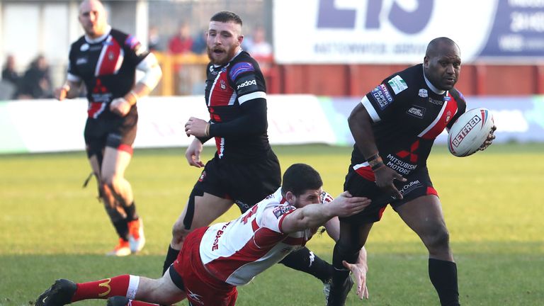 Picture by Ash Allen/SWpix.com - 23/02/2019 - Rugby League - Betfred Super League - Hull KR v Salford Red Devils - KCOM Craven Park, Hull, England - Mitch Garbutt of Hull KR attempts to tackle Robert Lui of Salford Red Devils.