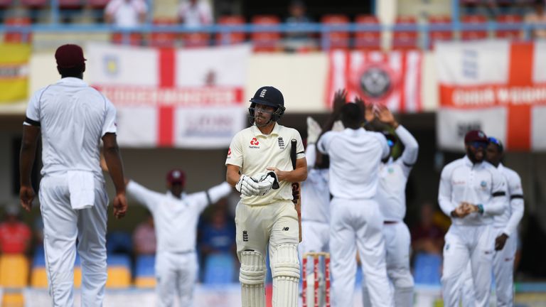 Rory Burns walks off after being dismissed by Jason Holder on day three of the second Test