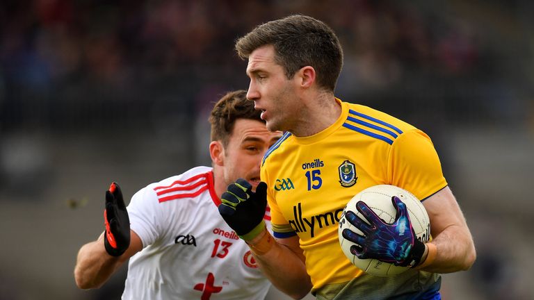 Cathal Cregg of Roscommon in action against Darren McCurry of Tyrone