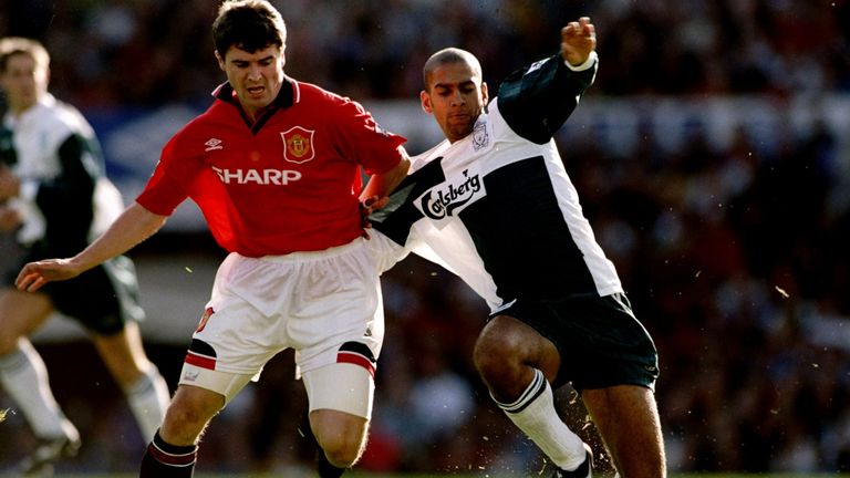 Roy Keane and Phil Babb in action during a memorable Premier League encounter