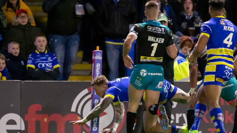 Warrington's Josh Charnley scores a try against Leeds 