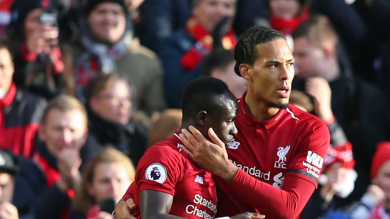 Sadio Mane celebrates his opener with team-mate Virgil van Dijk