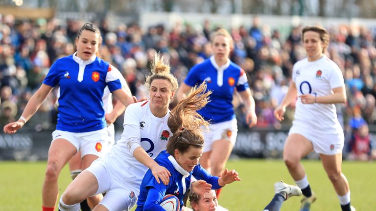England's Sarah McKenna tackles Camille Imart of France at Doncaster