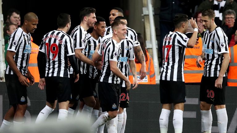 Fabian Schar celebrates with team-mates during the Premier League match between Newcastle United and Burnley FC at St. James Park on February 26, 2019