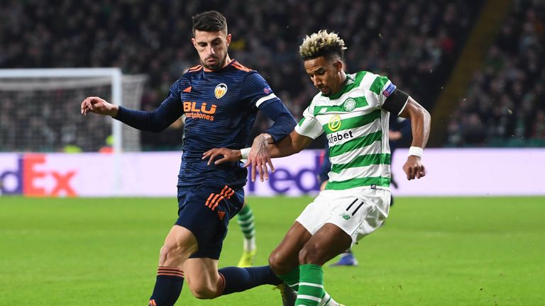 Celtic's Scott Sinclair (R) in action with Valencia's Cristiano Piccini during Europa League last-32 first leg