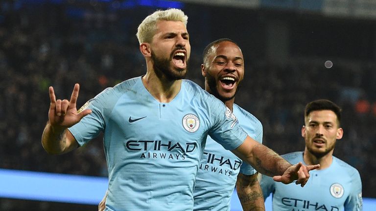 Sergio Aguero celebrates with Raheem Sterling and David Silva after putting Manchester City 1-0 up