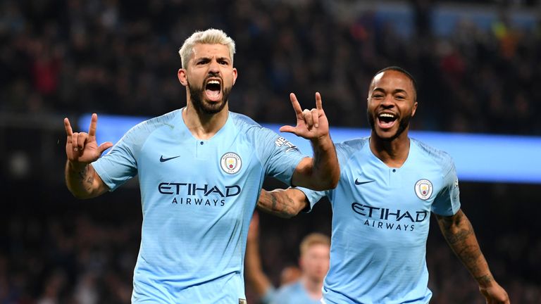 Sergio Aguero celebrates with Raheem Sterling after putting Manchester City 1-0 up