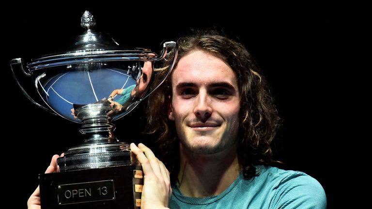 Greece's Stefanos Tsitsipas poses with the trophy after winning the ATP Open 13 Provence tennis tournament in Marseille, southeastern France, on February 24, 2019.