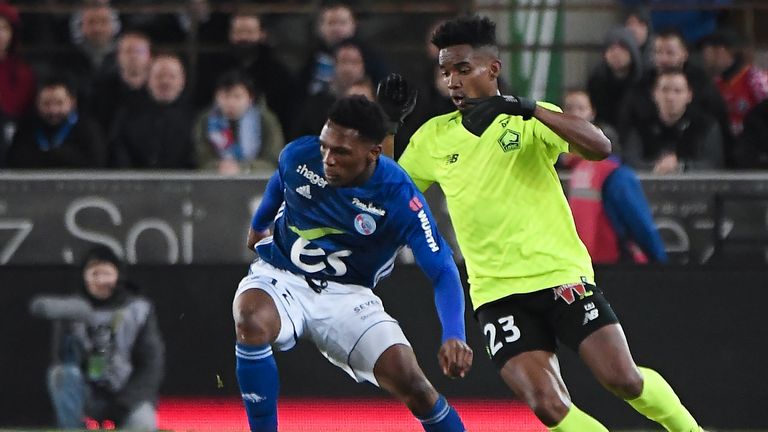 Lille's Thiago Mendes vies with Strasbourg's Lebo Mothiba during the French L1 clash.