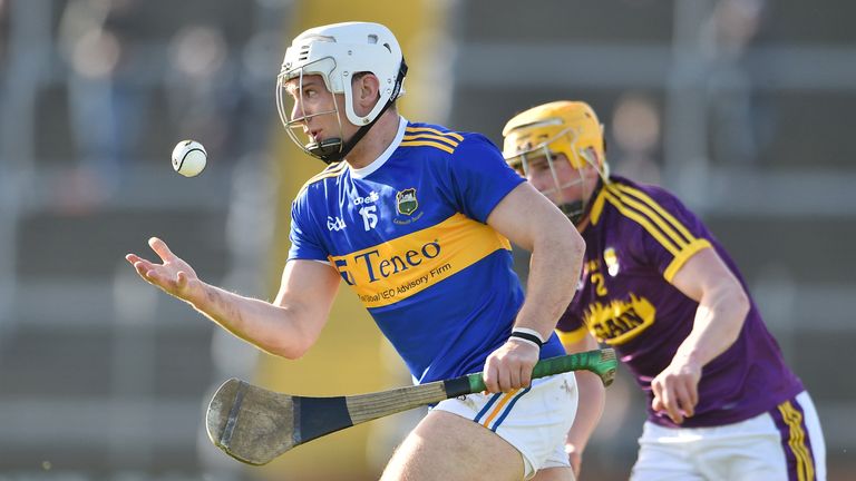 Niall O'Meara of Tipperary in action against Damien Reck of Wexford