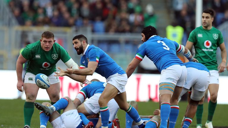 Tito Tebaldi of Italy is watched by Tadhg Furlong of Ireland as he passes the ball during the Guinness Six Nations match between Italy and Ireland at Stadio Olimpico on February 24, 2019 in Rome, Italy.