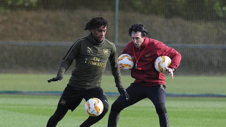 Unai Emery puts Alex Iwobi through his paces in Arsenal training