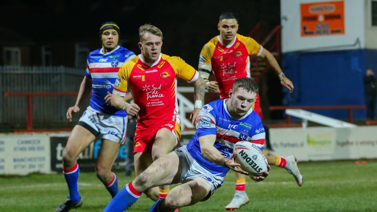 James Batchelor scores a try