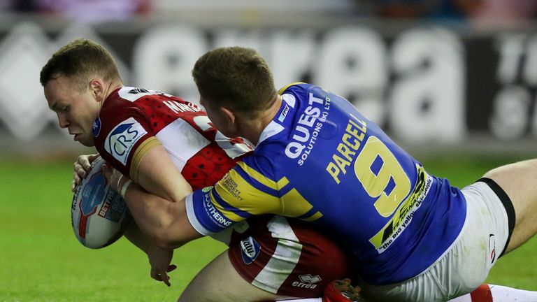 Wigan's Liam Marshall scores against Leeds Rhinos during their Super League clash at the DW Stadium in 2018