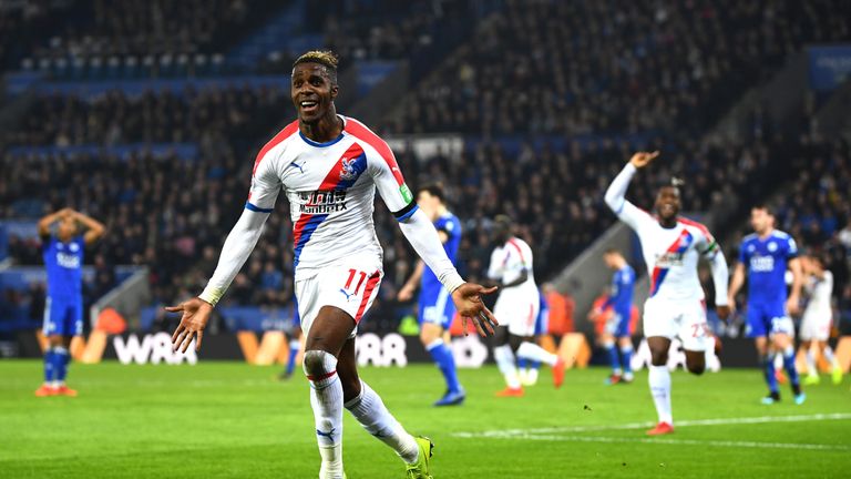 Wilfried Zaha of Crystal Palace celebrates after scoring his team's second goal during the Premier League match between Leicester City and Crystal Palace at The King Power Stadium on February 23, 2019 in Leicester, United Kingdom