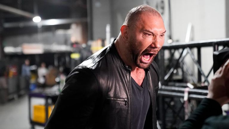 batista attacks ric flair wwe raw