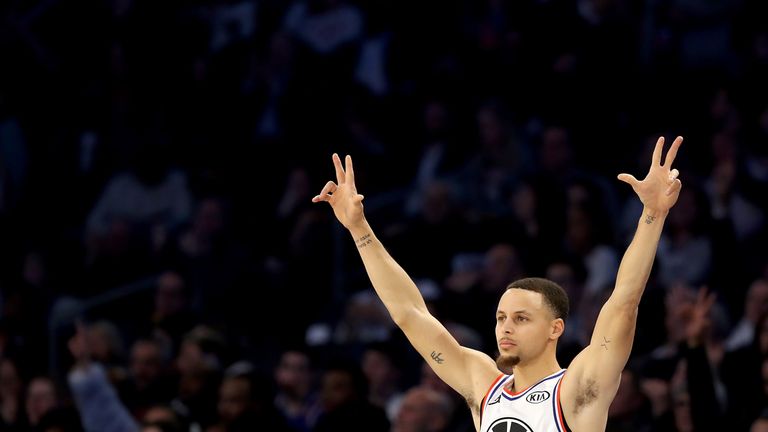 Stephen Curry salutes the crowd at the All-Star Game