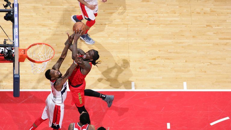 Taurean Prince finishes at the rim against Washington