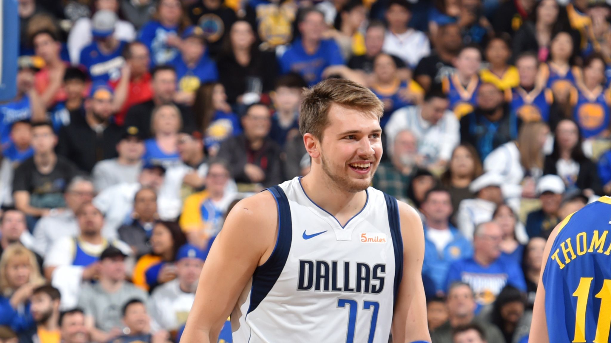 The Golden State Warriors' Nemanja Bjelica (8) guards against the Dallas  Mavericks' Luka Doncic (77) in the fourth quarter of Game 4 of their NBA  Western Conference finals playoff game at the