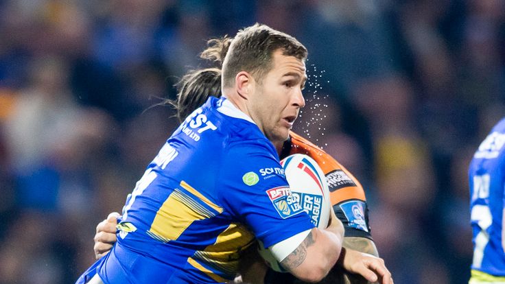 Leeds's Trent Merrin is tackled by Castleford's Alex Foster
