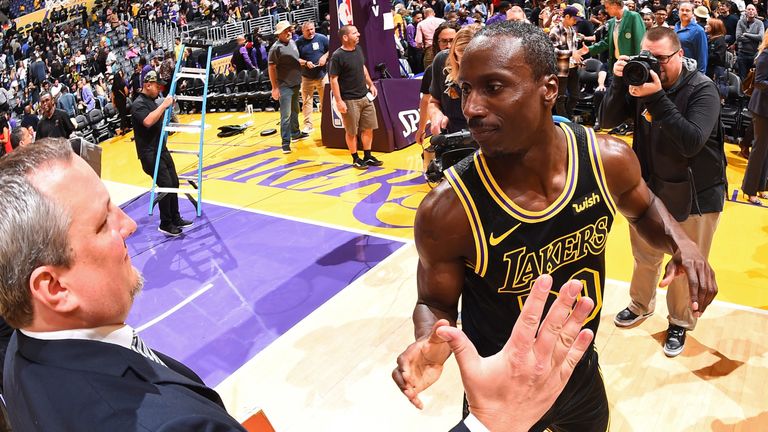 Andre Ingram receives congratulations after making his NBA debut as a 32-year-old