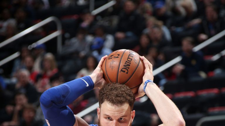 Blake Griffin faces up Jeremy Lin in Detroit's OT win over Toronto