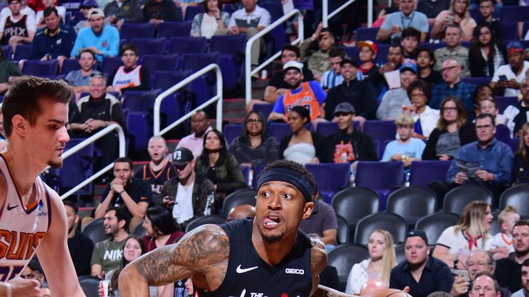 Bradley Beal drives baseline against the Suns