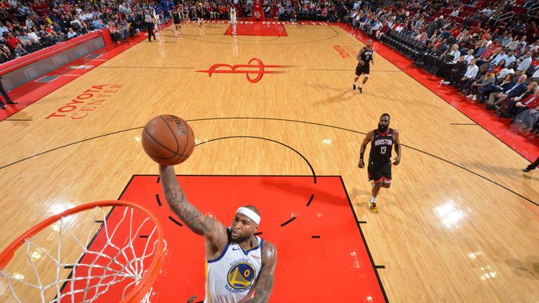 DeMarcus Cousins finishes at the rim against Houston