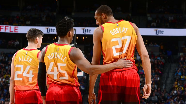 Donovan Mitchell chats with team-mate Rudy Gobert
