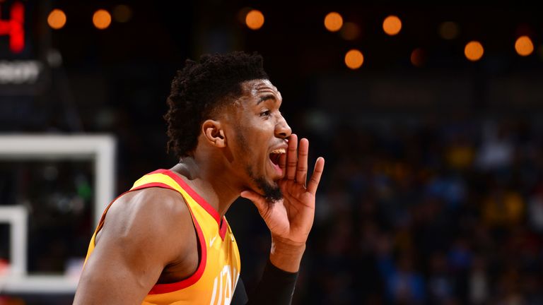 Donovan Mitchell yells encouragement during Utah's win in Denver