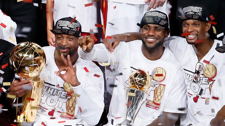 Miami&#39;s Big Three pose with the NBA title