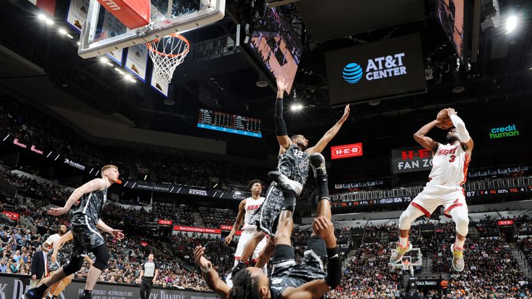 Dwyane Wade shoots from distance against the San Antonio Spurs