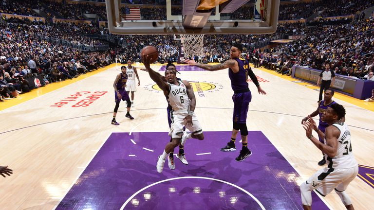 Eric Bledsoe powers his way to the hoop against the Lakers