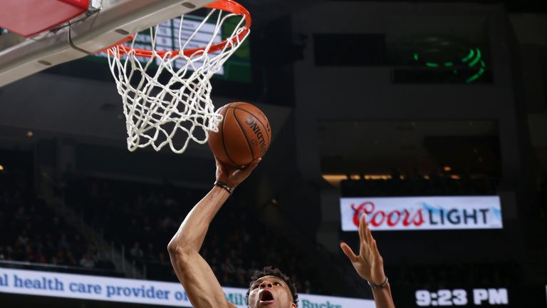 Giannis Antetokounmpo powers home a dunk against Indiana