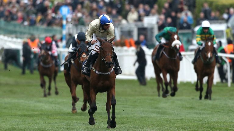 Jockey Alex Edwards celebrates his victory in the St. James's Place Foxhunter Challenge Cup Open Hunters' Chase on Hazel Hill 