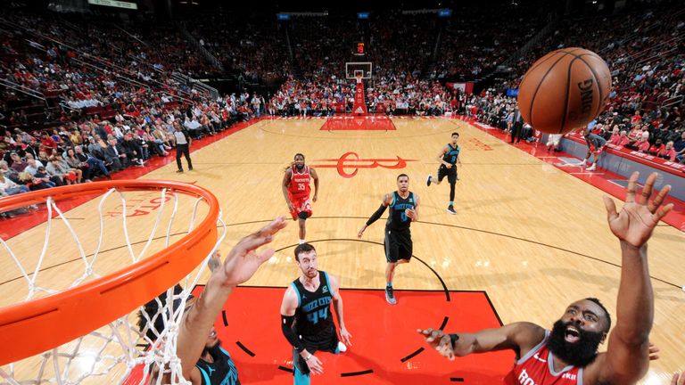 James Harden lofts a shot against Charlotte