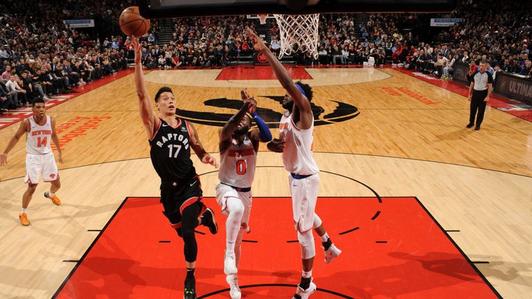 Jeremy Lin lofts a scoop shot for Toronto against his former team the New York Knicks